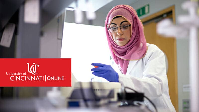 Women in lab looking at sample
